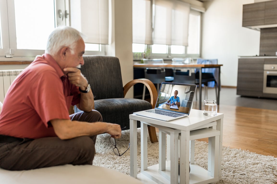 Senior man on online therapy